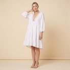 Bella Mini Dress White - three quarter angle on model