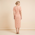 Dara Floral Midi Dress Peach Pink - back view on model