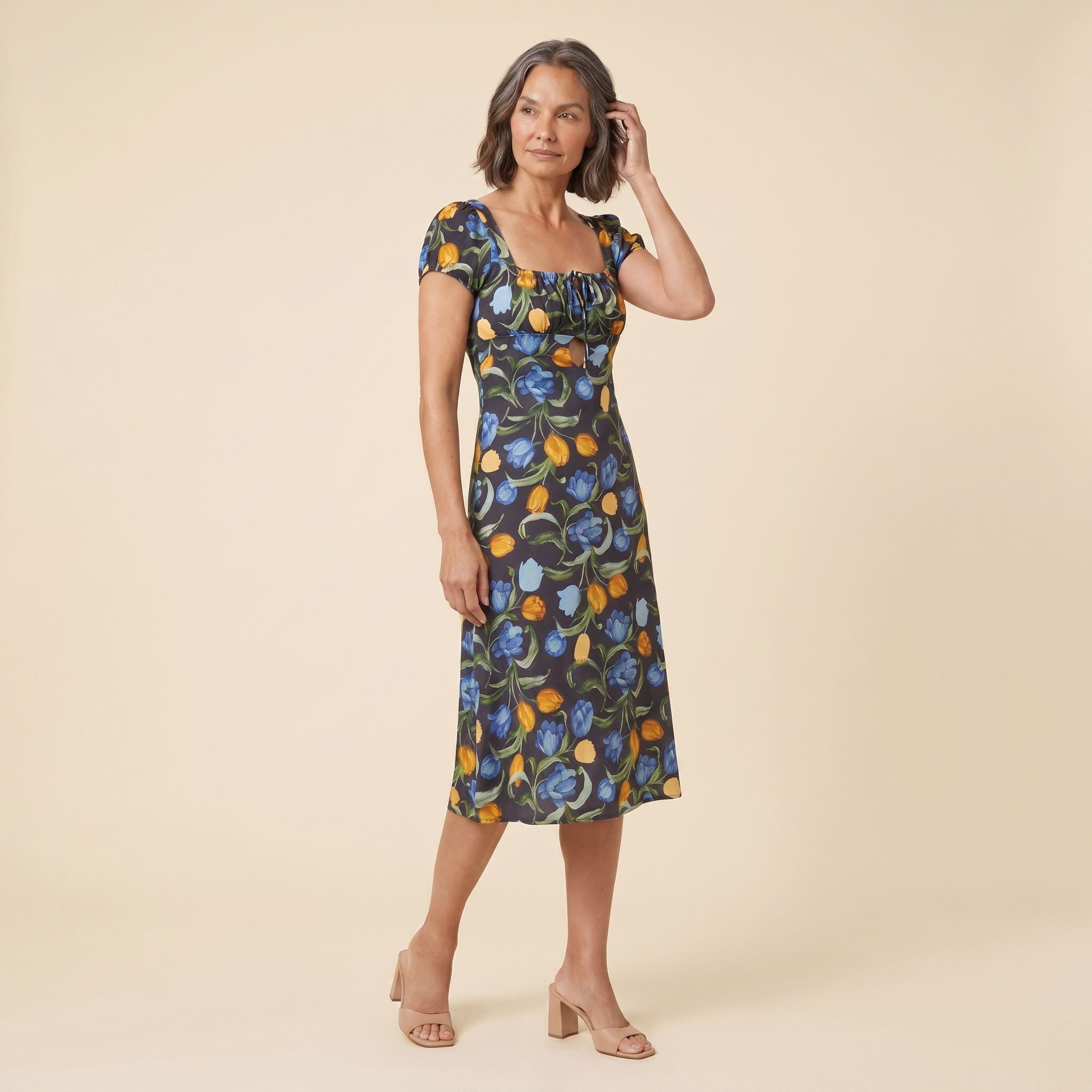 Ivy Summer Dress black floral print angled view on model
