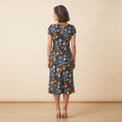 Ivy Summer Dress black floral print back view on model
