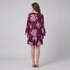 Kora Women's Dress bias cut tiered panels back view on model