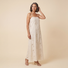 Mira Maxi Dress beige cutwork A-line dress angled view model
