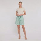 Pamela Boutique mint floral pleated shorts tie belt, model front pose B