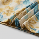 Pamela Boutique beige floral fabric texture close-up