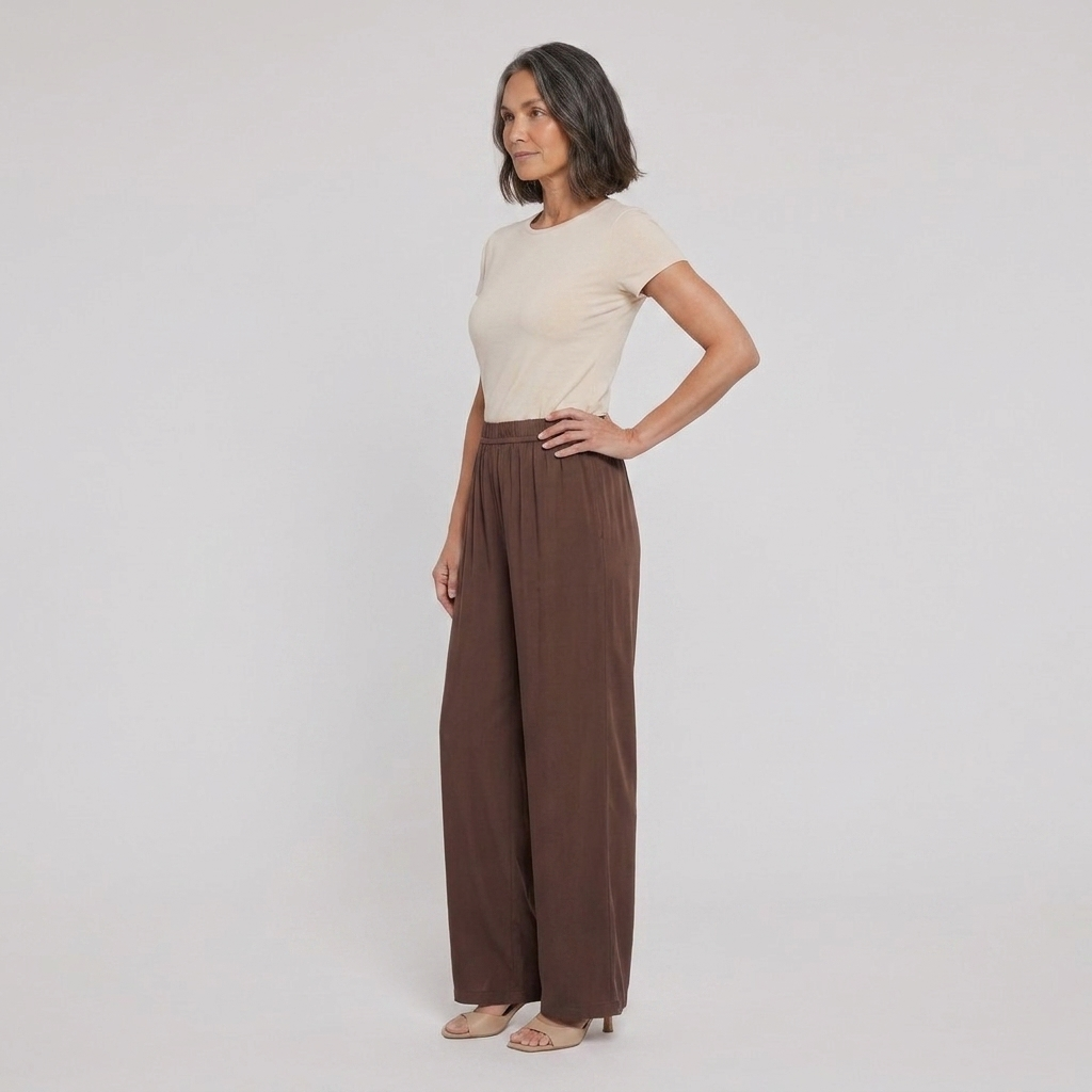 Pamela Boutique brown wide leg trousers, model side view