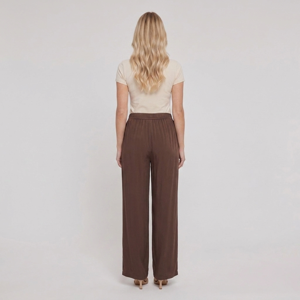 Pamela Boutique brown wide leg trousers, model back view
