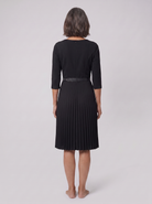 Ilona belted split-sleeve midi dress in black, back view on model
