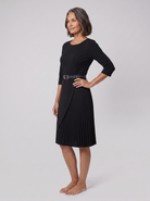 Ilona belted split-sleeve midi dress in black on model