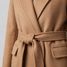 Ines wrap coat tied belt and wool-blend fabric close-up