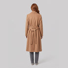 Ines longline belted wrap coat in camel, back view on model