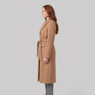 Ines longline belted wrap coat in camel, side view on model