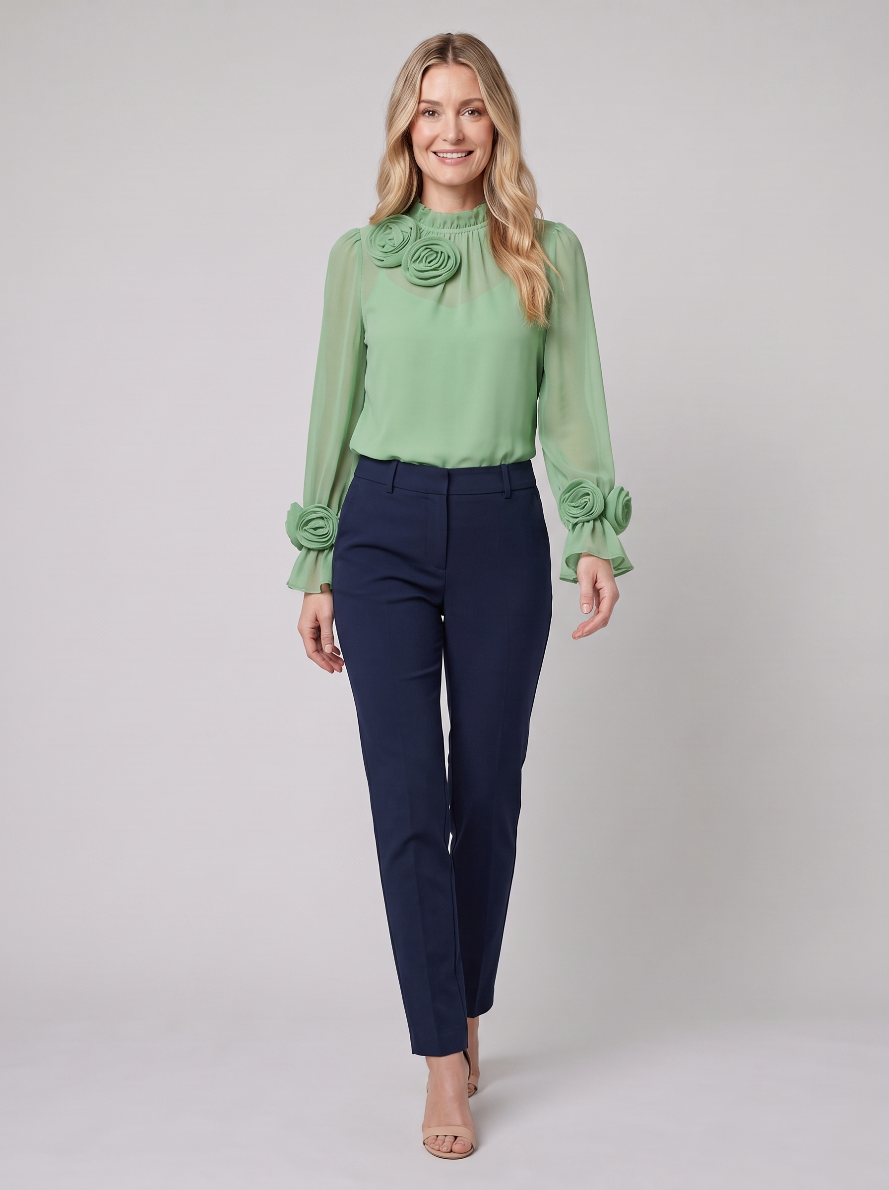 Iona sheer chiffon blouse with 3D rosettes in green on model
