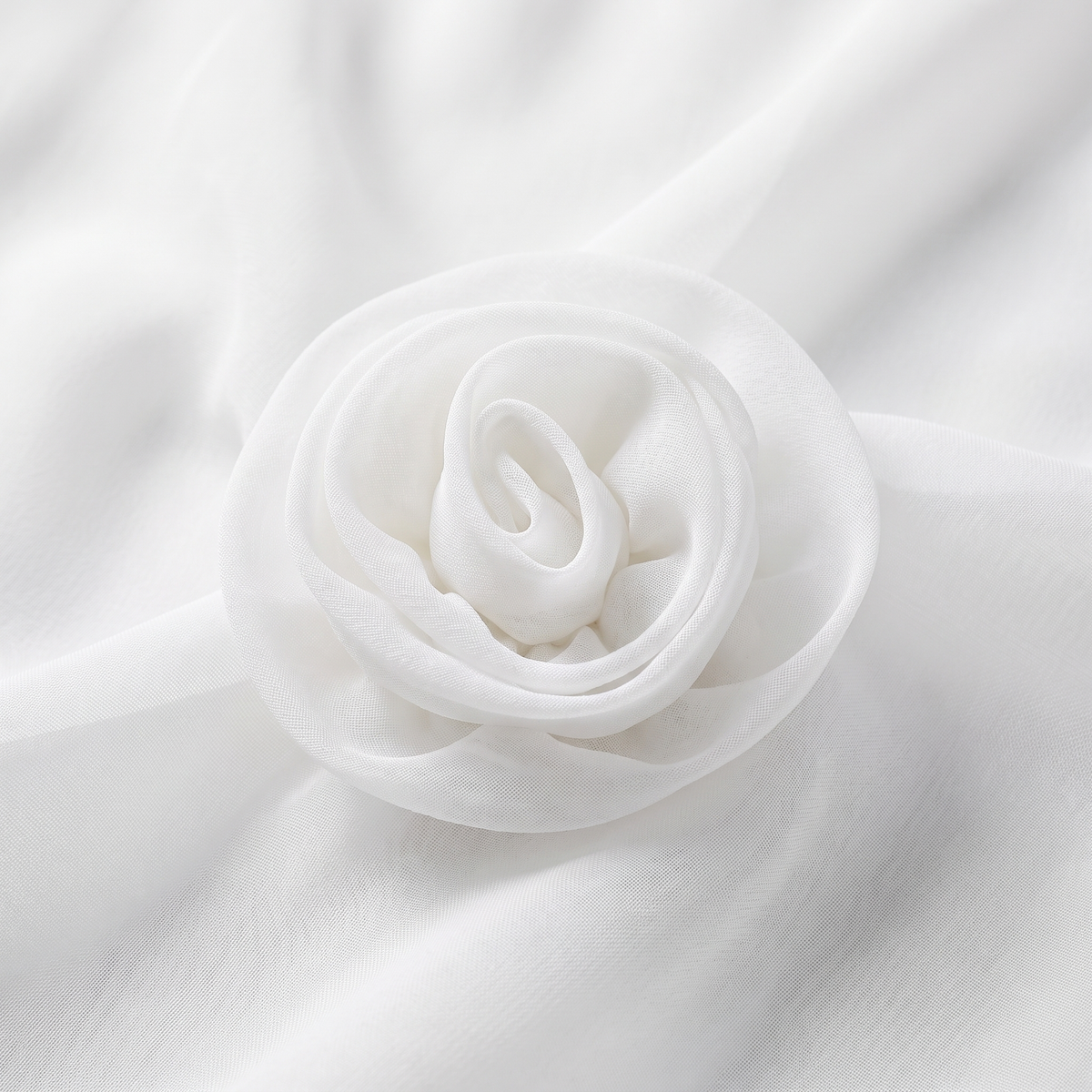 Iona chiffon blouse 3D rosette and sheer fabric close-up