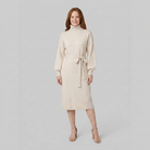 Isabella wool-blend turtleneck knit midi dress in cream on model