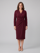 Isla burgundy wrap midi dress with tie waist on model
