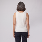 Ivanna sleeveless knit vest in ivory, back view on model