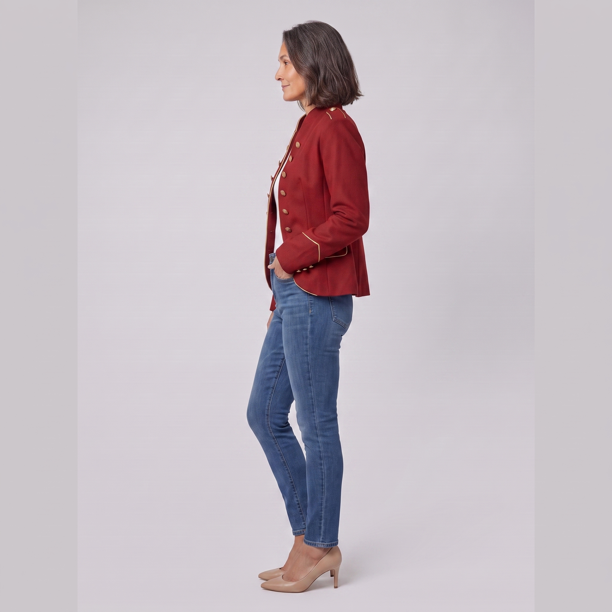 Ivy red velvet blazer with gold buttons, side view on model