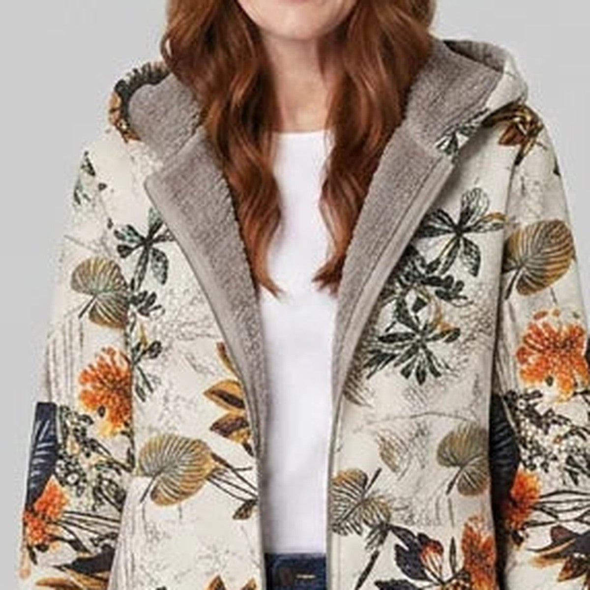 Close-up of women's floral print hooded fleece-lined coat