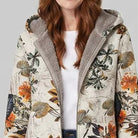 Close-up of women's floral print hooded fleece-lined coat