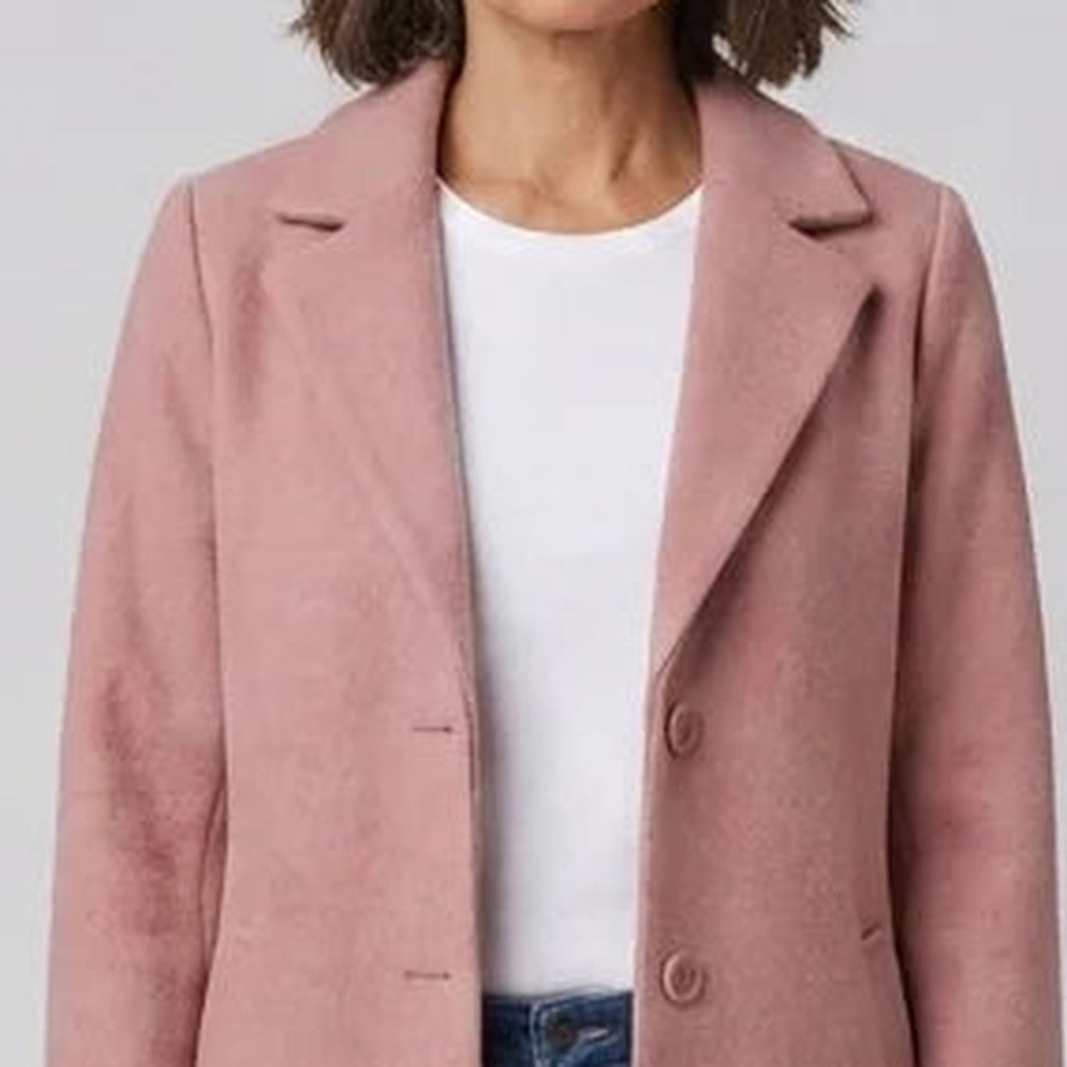 Close-up of women's dusty pink single-breasted coat