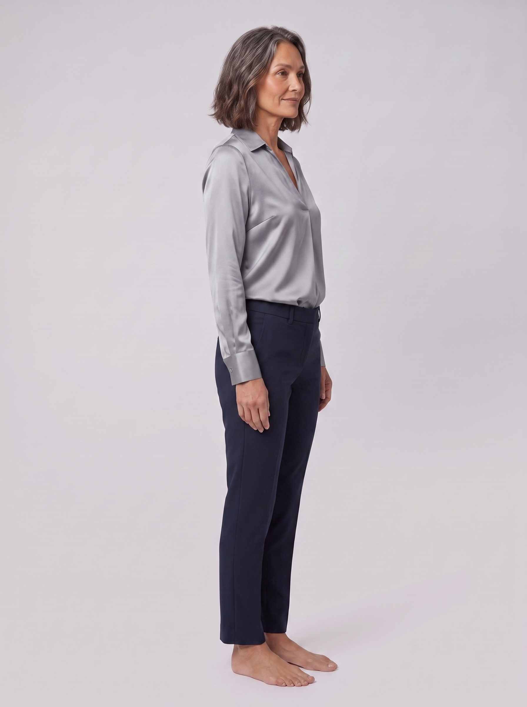 Lena metallic V-neck blouse in silver, side view on model