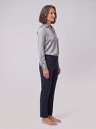 Lena metallic V-neck blouse in silver, side view on model