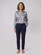 Lena metallic V-neck blouse in silver on model