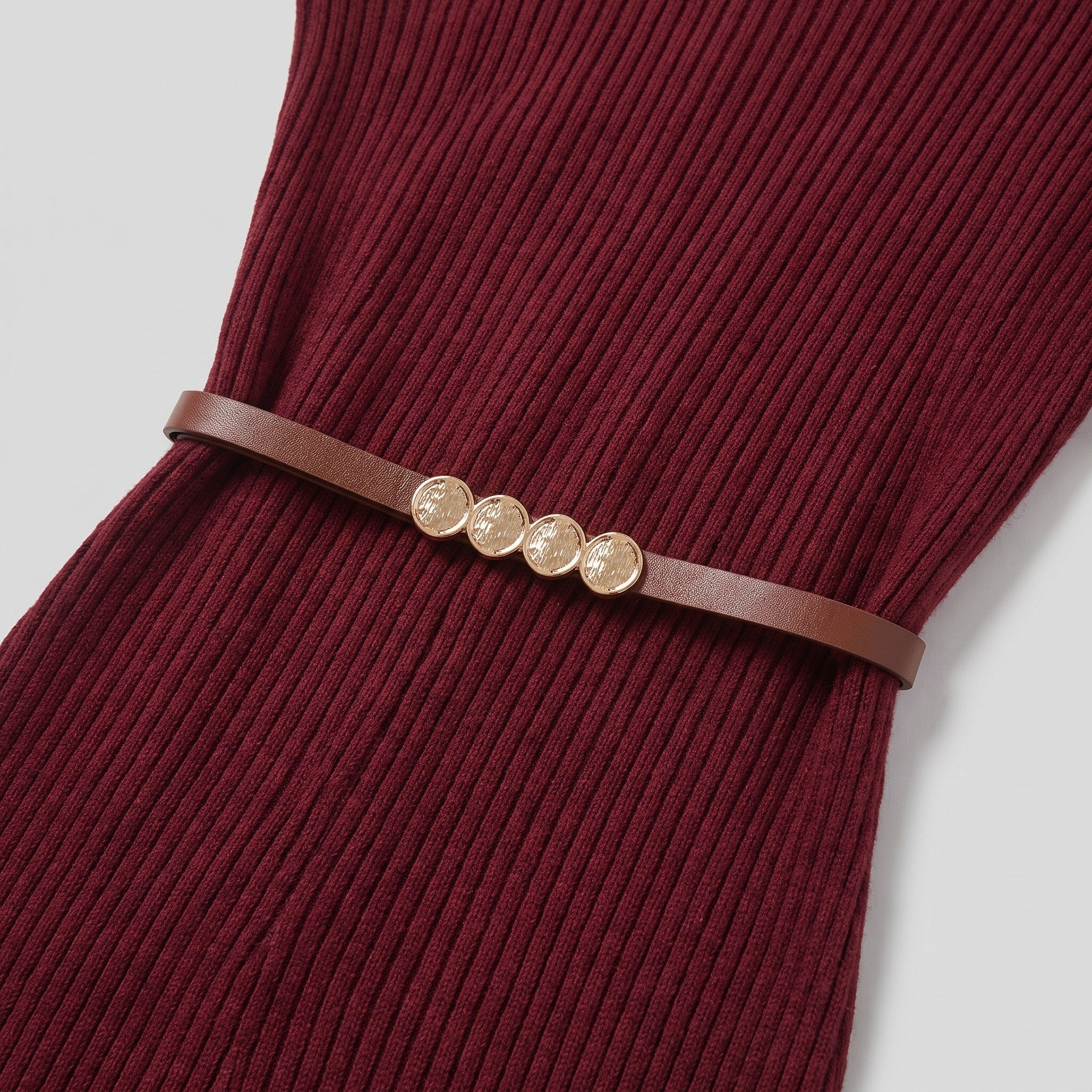Liora turtleneck dress leather belt and rib texture close-up