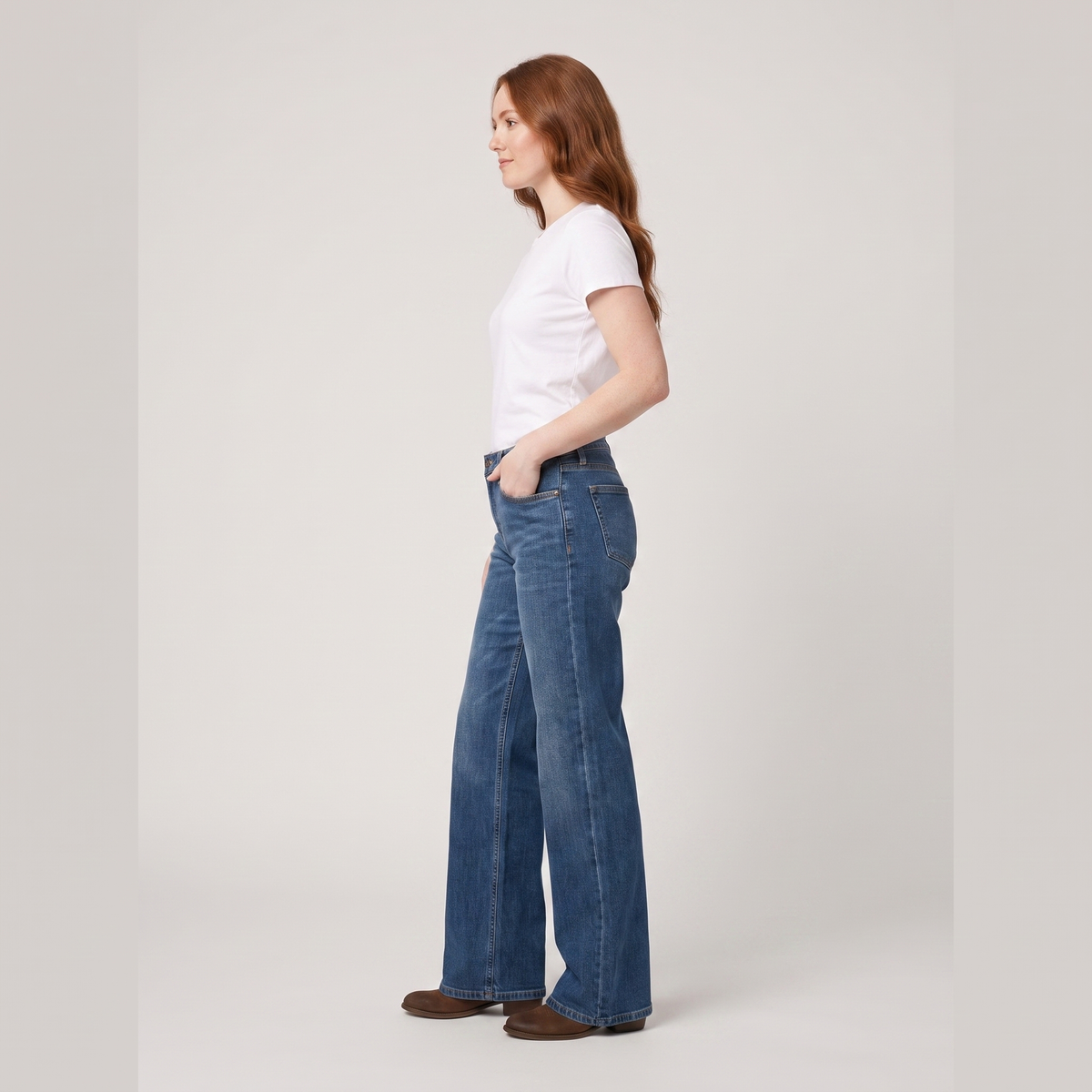 Maren wide-leg jeans in mid blue, side view on model