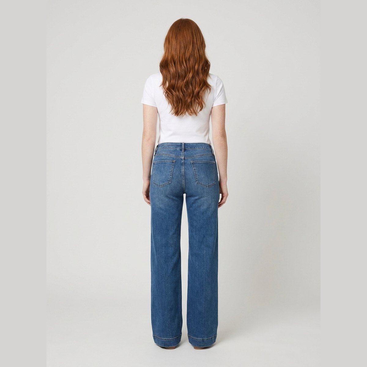 Maren high-rise wide-leg jeans in mid blue, back view on model
