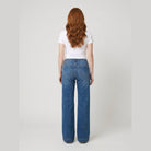 Maren high-rise wide-leg jeans in mid blue, back view on model