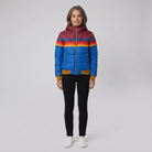 Mila retro rainbow stripe hooded puffer jacket in blue on model
