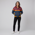 Mila rainbow stripe hooded puffer jacket in navy, front view on model