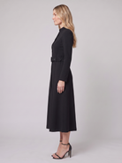 Nola belted A-line midi dress in black, side view on model
