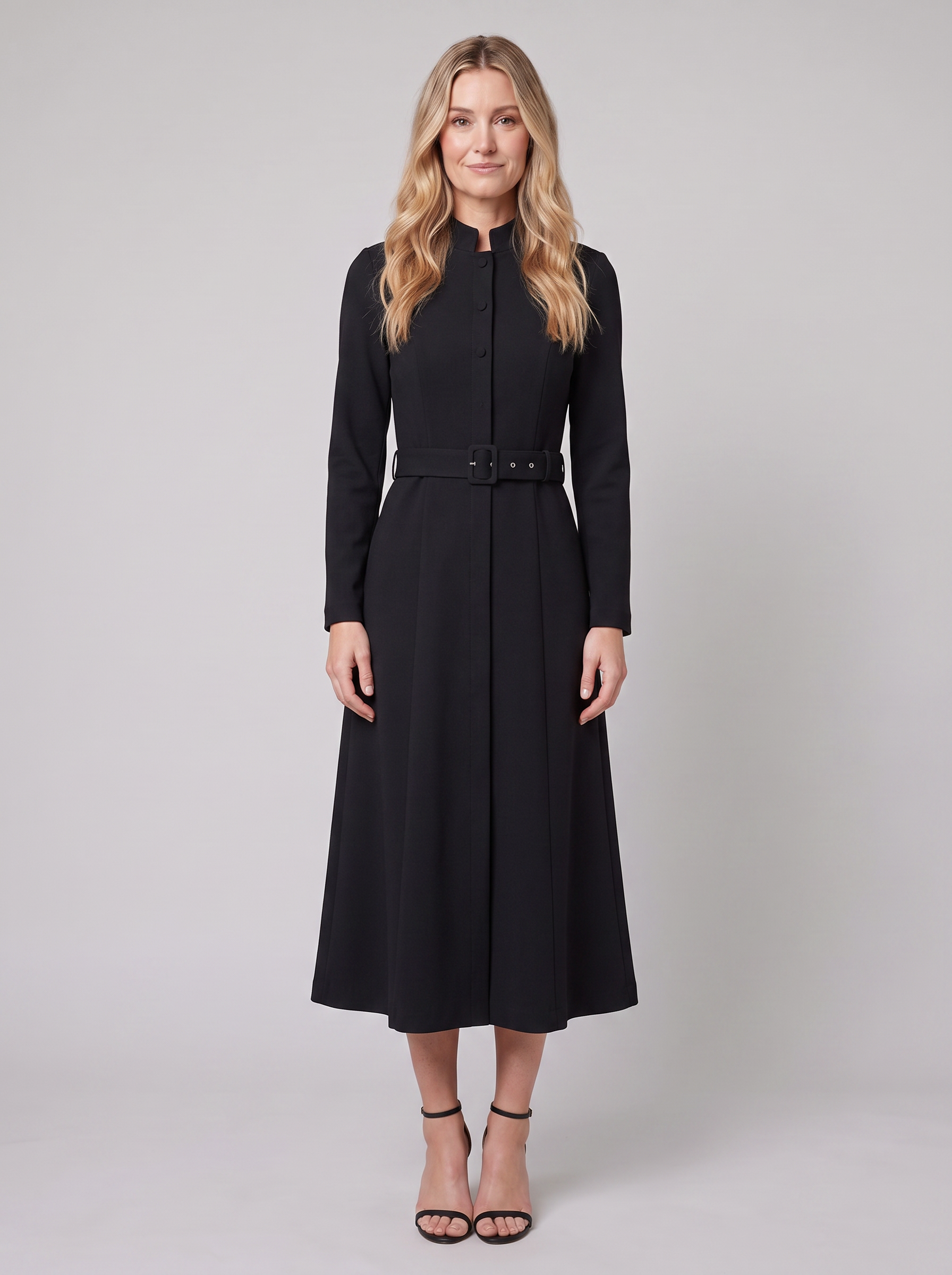 Nola belted A-line midi dress with stand collar in black on model
