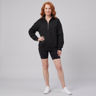 Paloma oversized half-zip sweatshirt in black on model