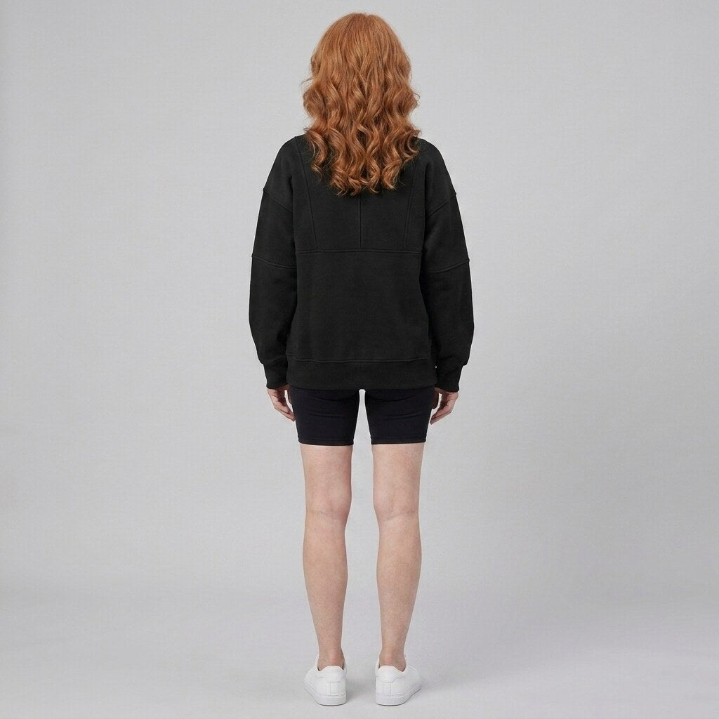 Paloma oversized half-zip sweatshirt in jet black on model