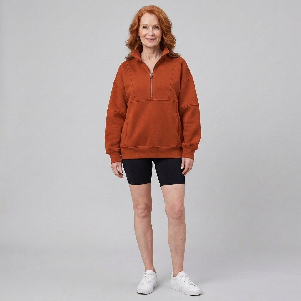 Paloma oversized half-zip sweatshirt in orange on model