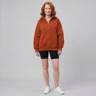 Paloma oversized half-zip sweatshirt in orange on model