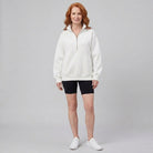 Paloma oversized half-zip sweatshirt in white on model