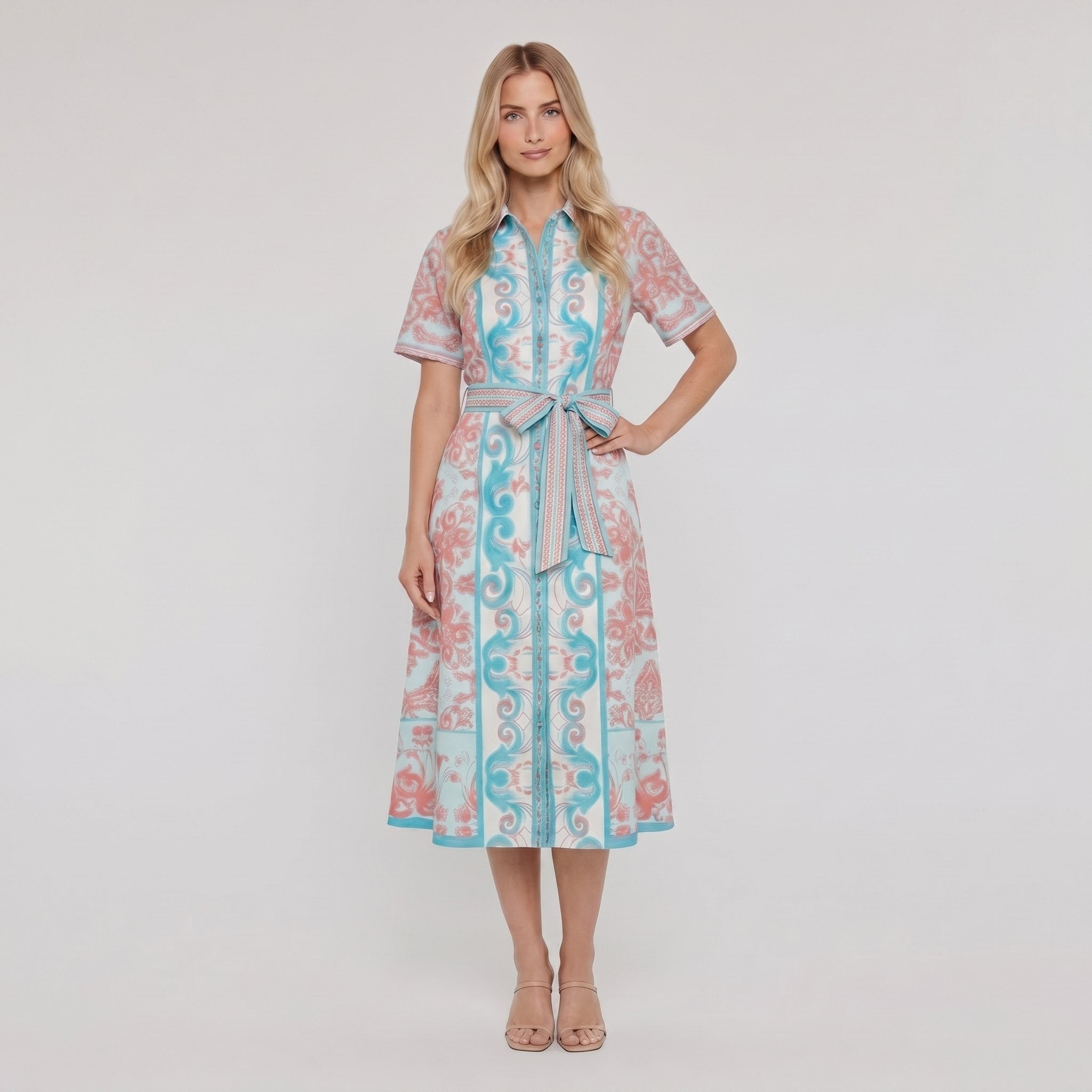 Women's white A-line collared midi dress with button front and tie belt, full-length model photo