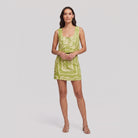Lime green linen co-ord set with cream bandana print, front view