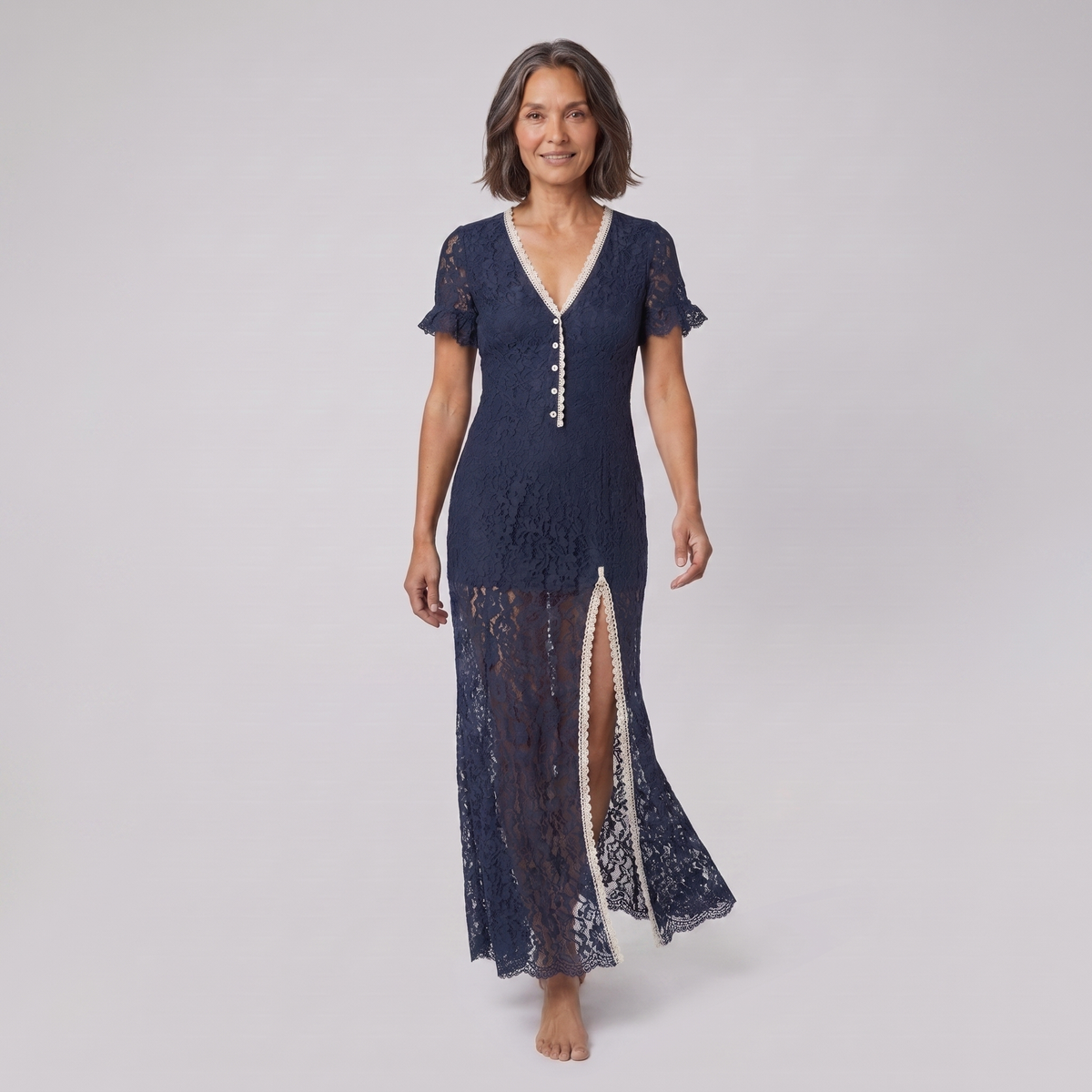 Bora Midi Dress in navy floral lace, model walking shot — walk