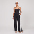 Black lace-up corset top and wide-leg trouser set, front view