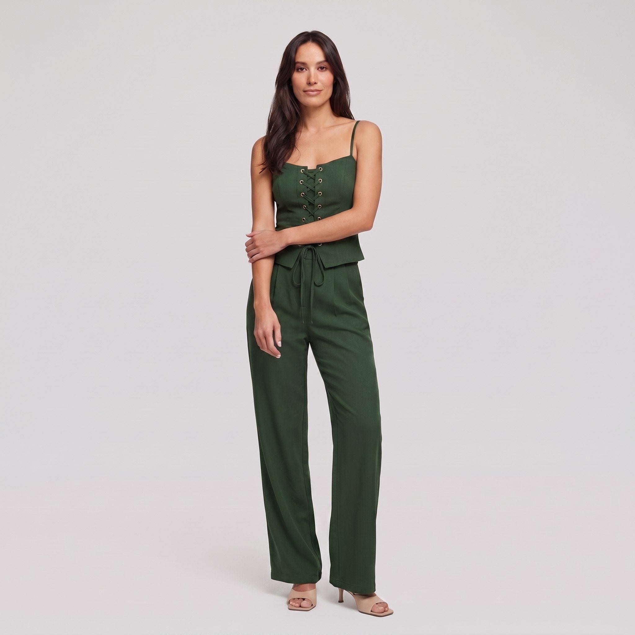 Forest green lace-up corset top and wide-leg trouser set, front view