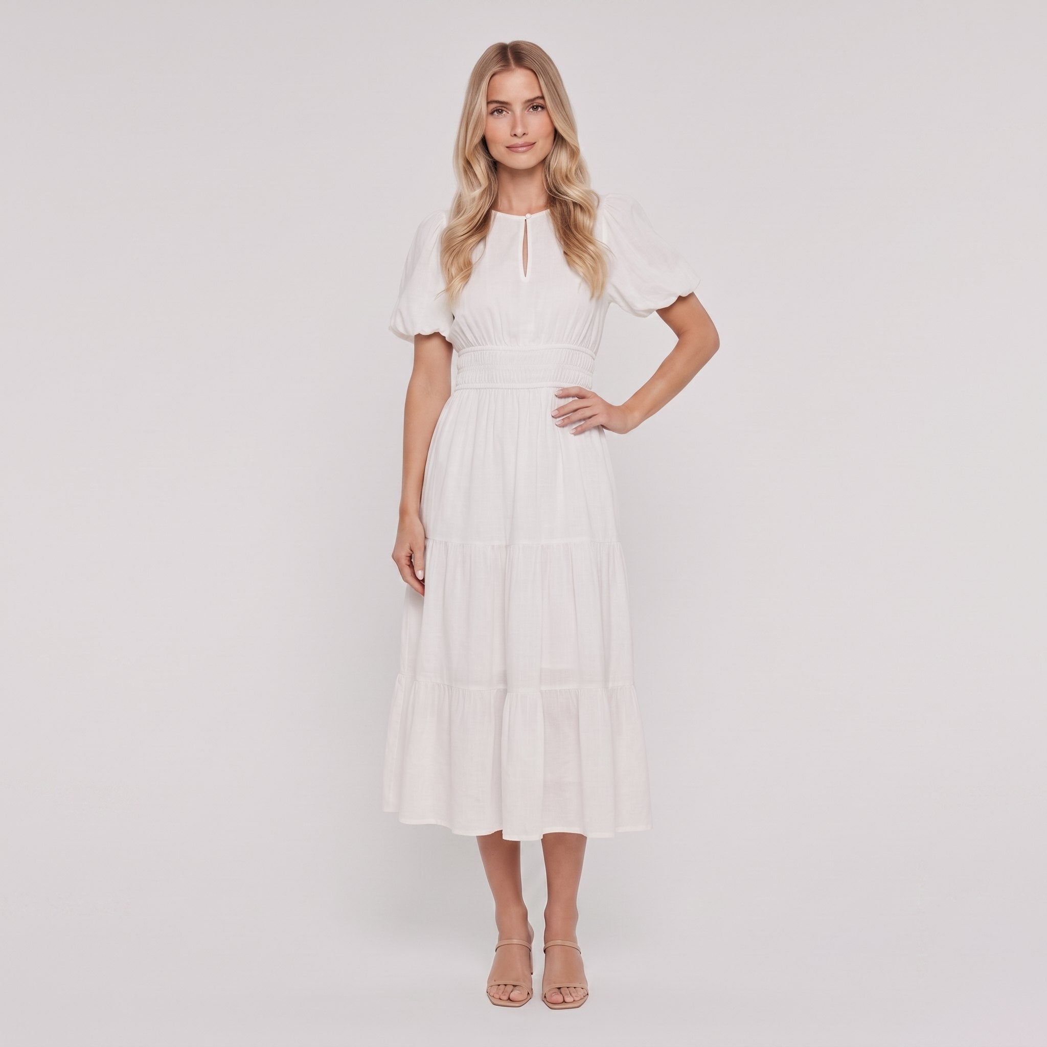 White lightweight cotton midi dress with balloon sleeves, front view on model