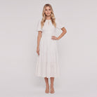 White lightweight cotton midi dress with balloon sleeves, front view on model