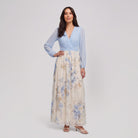 Floral maxi dress with light blue bodice and cream floral skirt, front view on model
