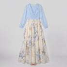 Floral maxi dress with blue bodice and cream floral skirt, product flat-lay