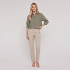 Model wearing forest green linen shirt - Cleo Women's Shirt
